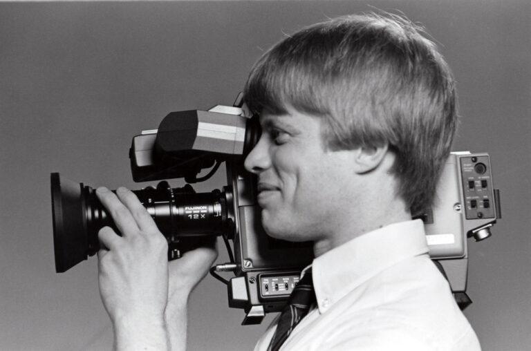 A camera operator recording video content